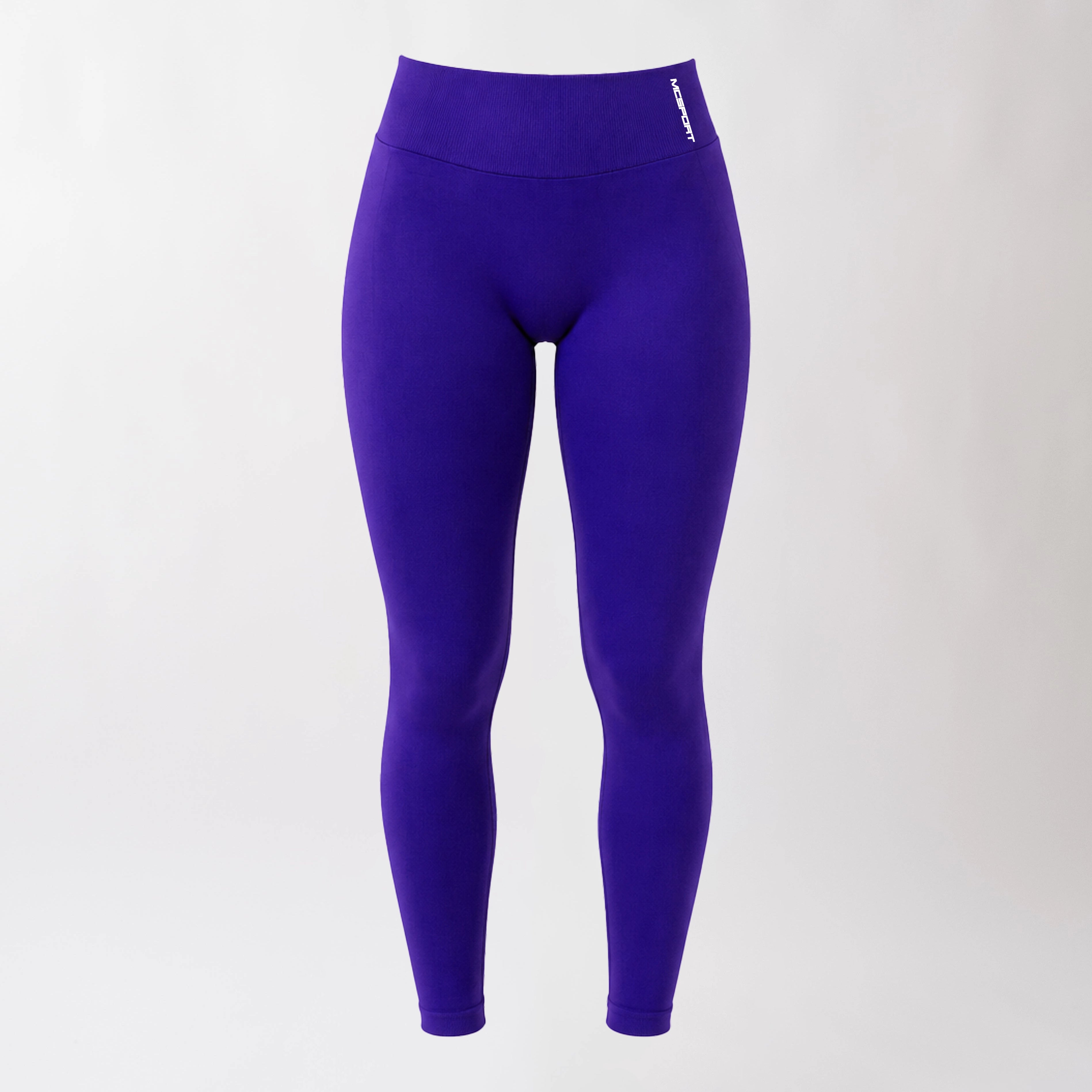 Leggings sportivi viola da donna con fascia alta in vita, morbidi ed elasticizzati.