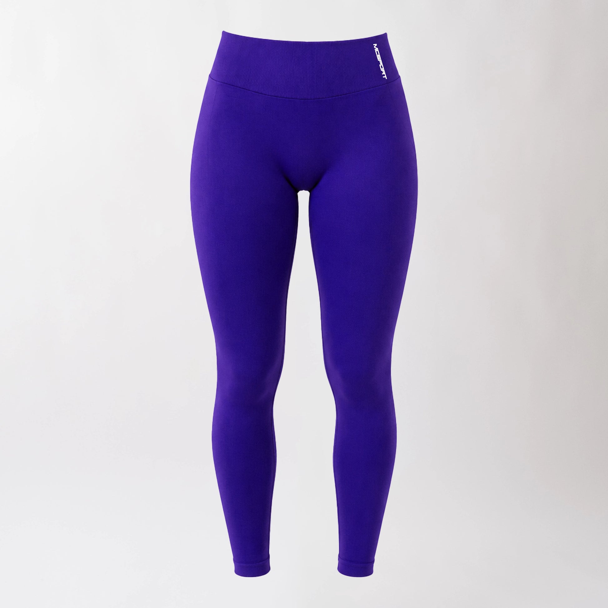 Leggings sportivi viola da donna con fascia alta in vita, morbidi ed elasticizzati.