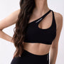 Top sportivo monospalla nero da donna indossato dal design moderno ed essenziale, con supporto confortevole e tessuto elasticizzato. 