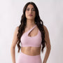 Top sportivo monospalla nero da donna indossato dal design moderno ed essenziale, con supporto confortevole e tessuto elasticizzato. Ideale per fitness, yoga, pilates e allenamenti.