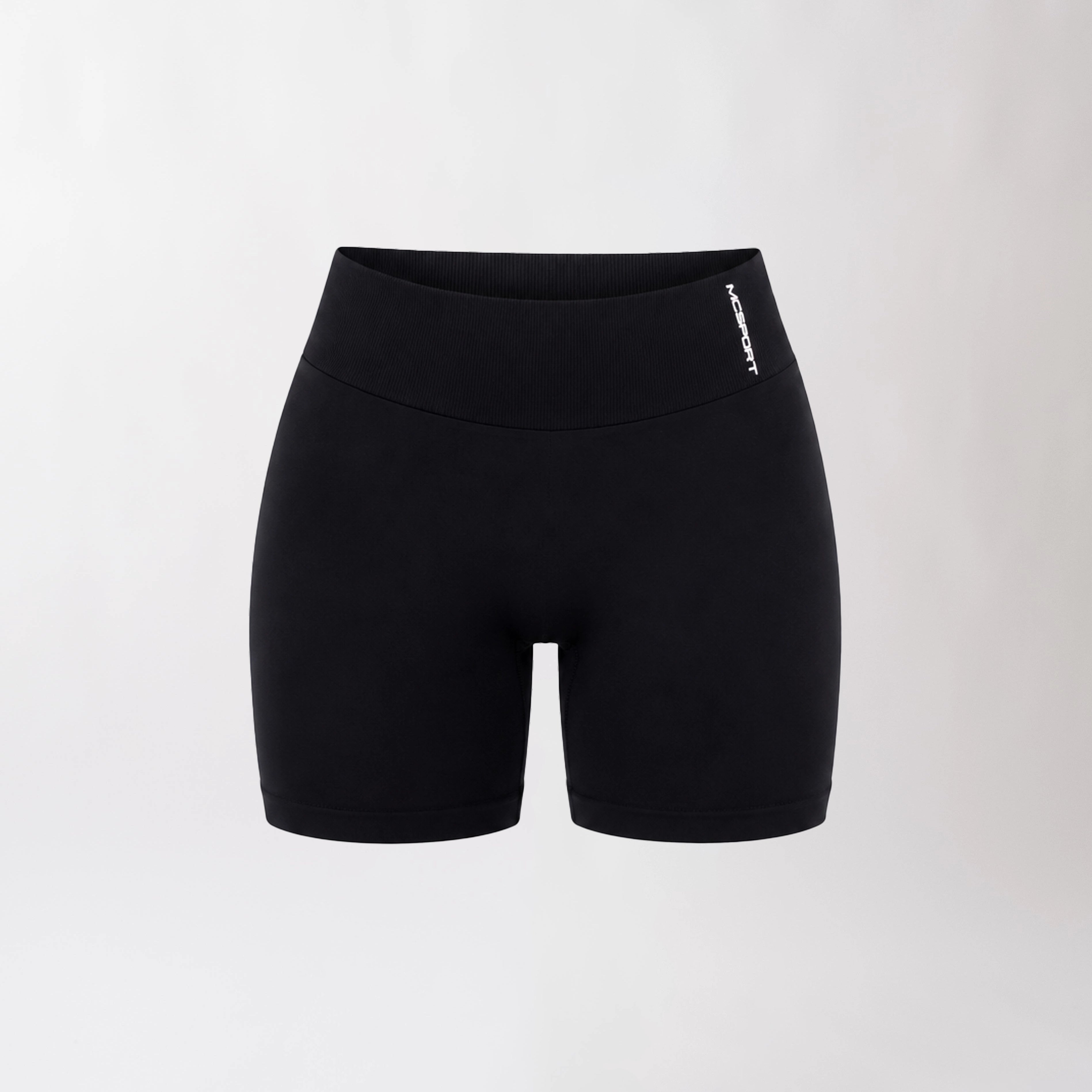 Shorts sportivi neri da donna con fascia alta in vita, morbidi ed elasticizzati.