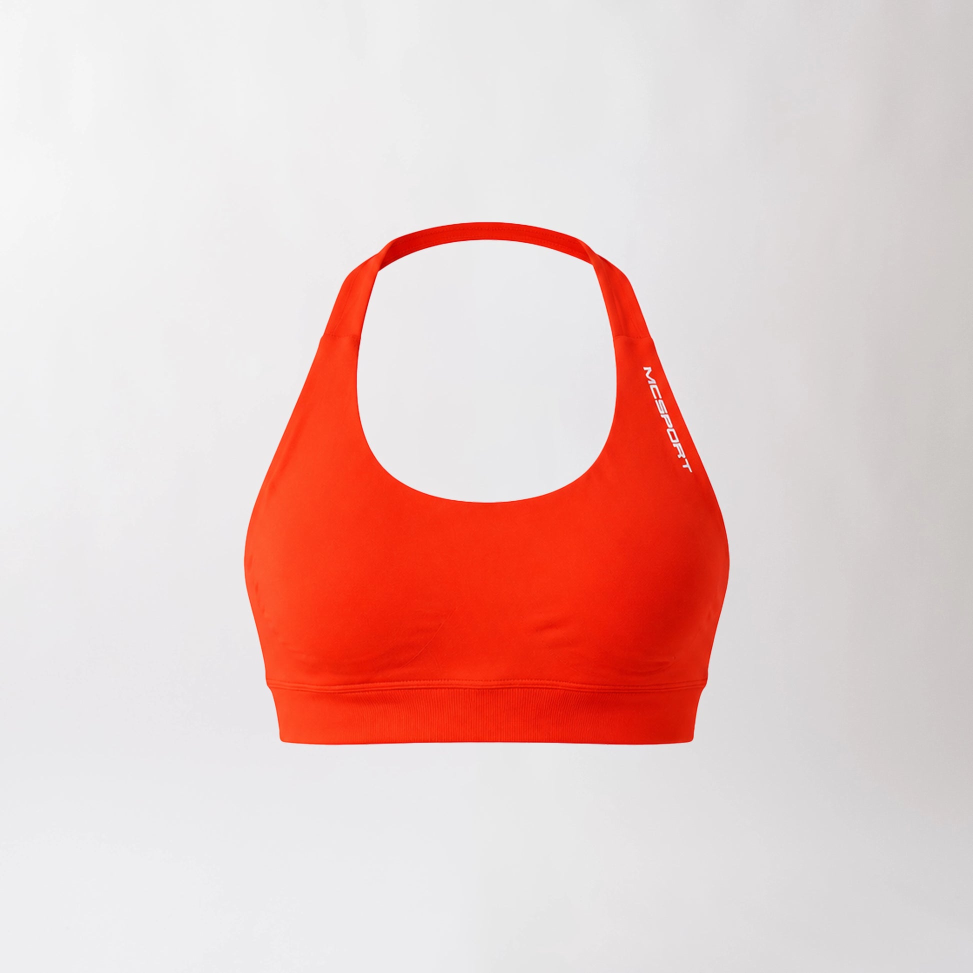 Top sportivo color corallo da donna dal design essenziale e confortevole, ideale per fitness, palestra, yoga e pilates.
