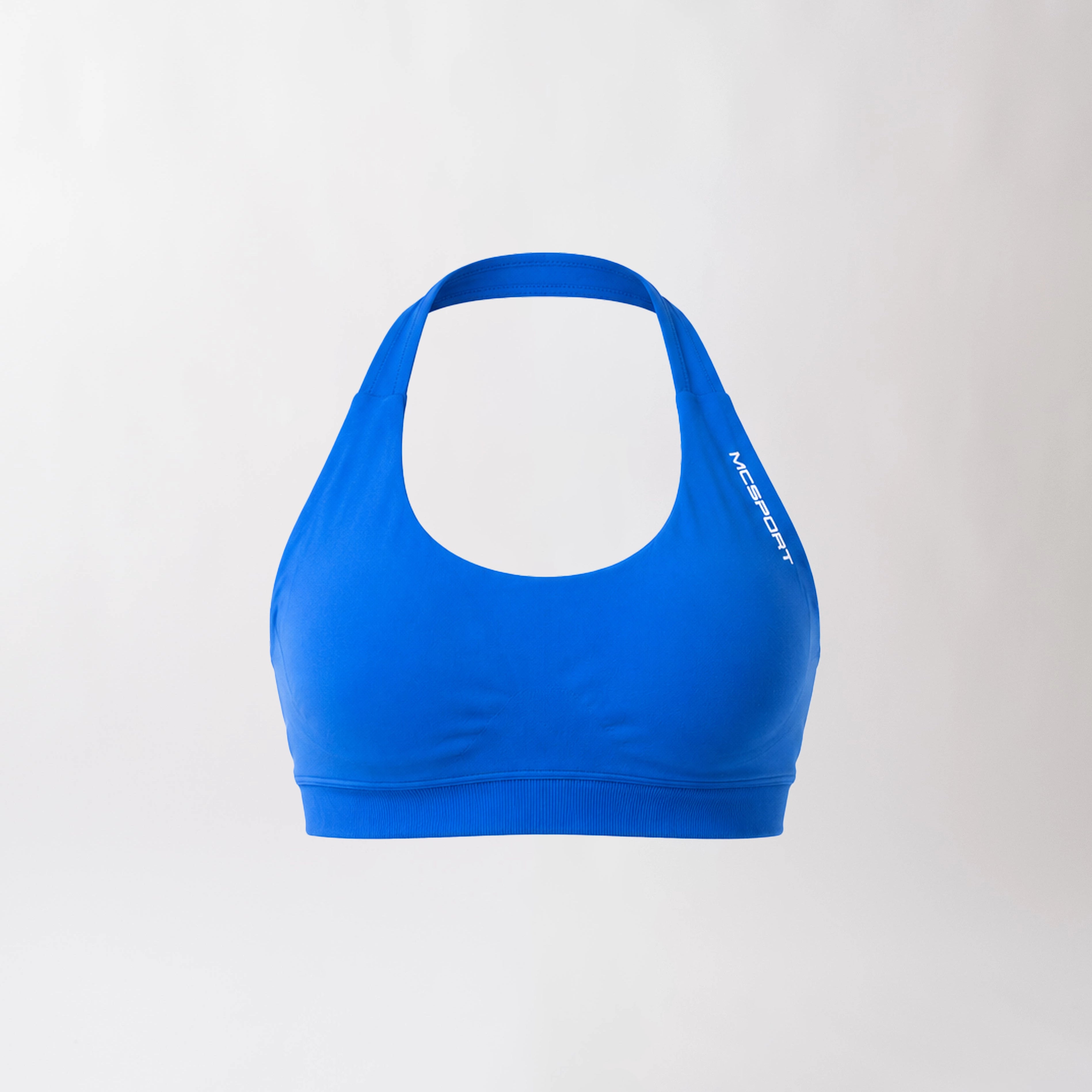 Top sportivo ciano da donna dal design essenziale e confortevole, ideale per fitness, palestra, yoga e pilates.