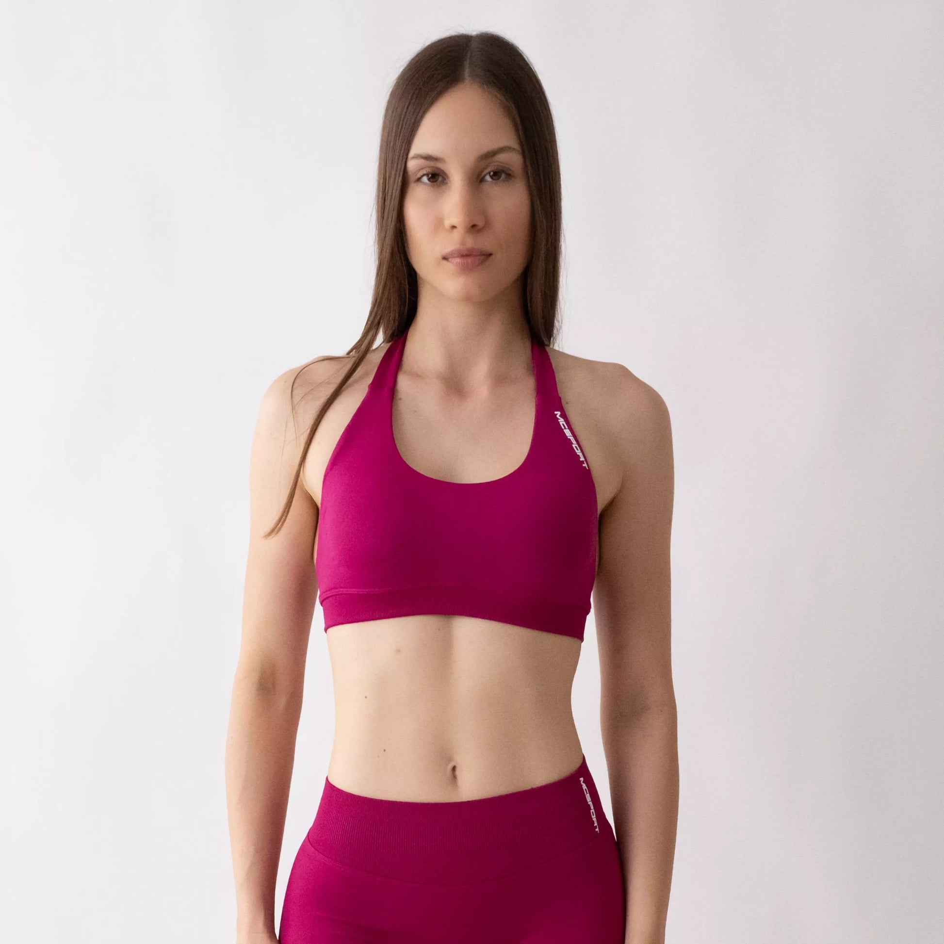 Top sportivo color orchidea da donna indossato dal design essenziale e confortevole, ideale per fitness, palestra, yoga e pilates.