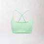 Top sportivo monospalla color menta da donna dal design moderno ed essenziale, con supporto confortevole e tessuto elasticizzato. Ideale per fitness, yoga, pilates e allenamenti.