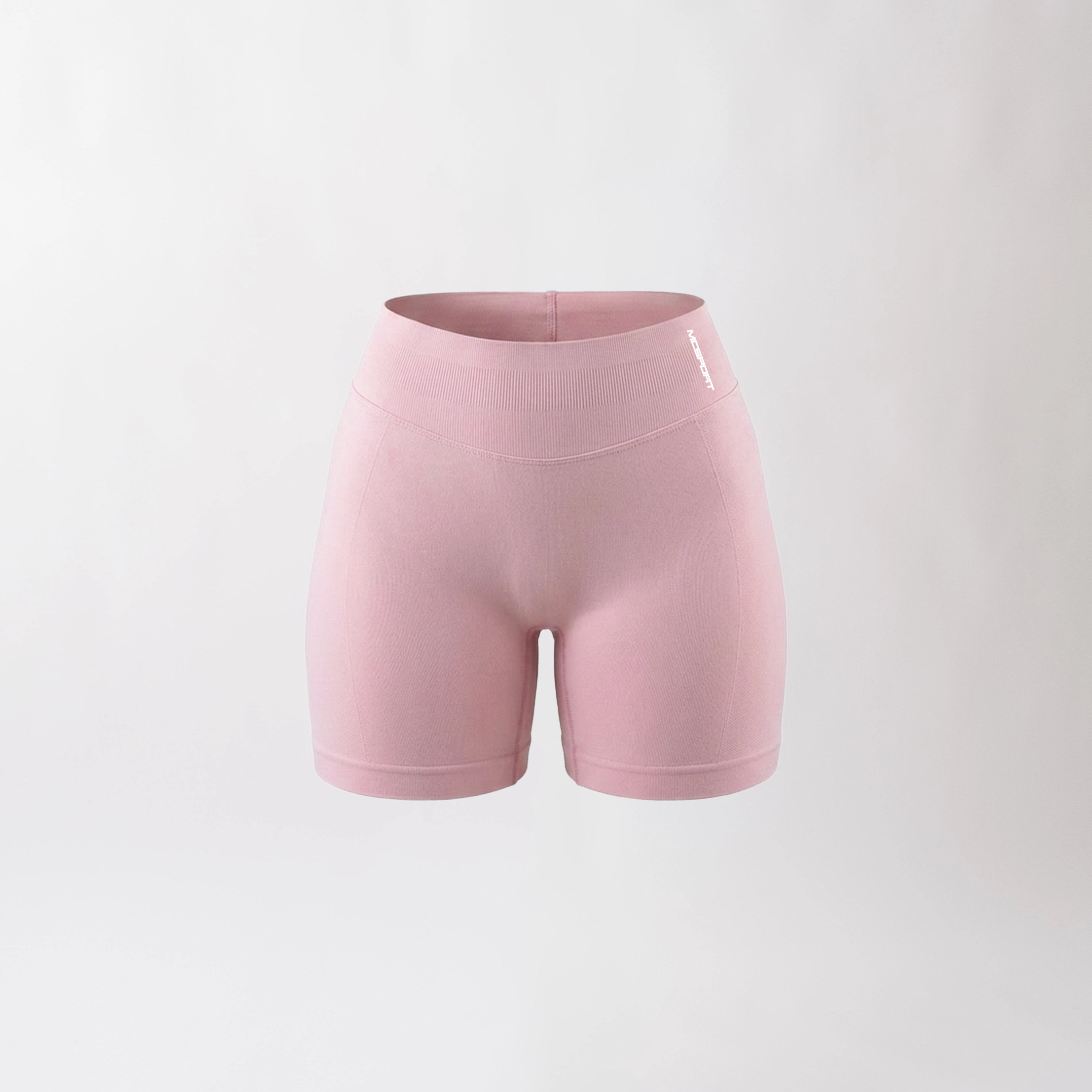 Shorts sportivi rosa da donna con fascia alta in vita, morbidi ed elasticizzati.