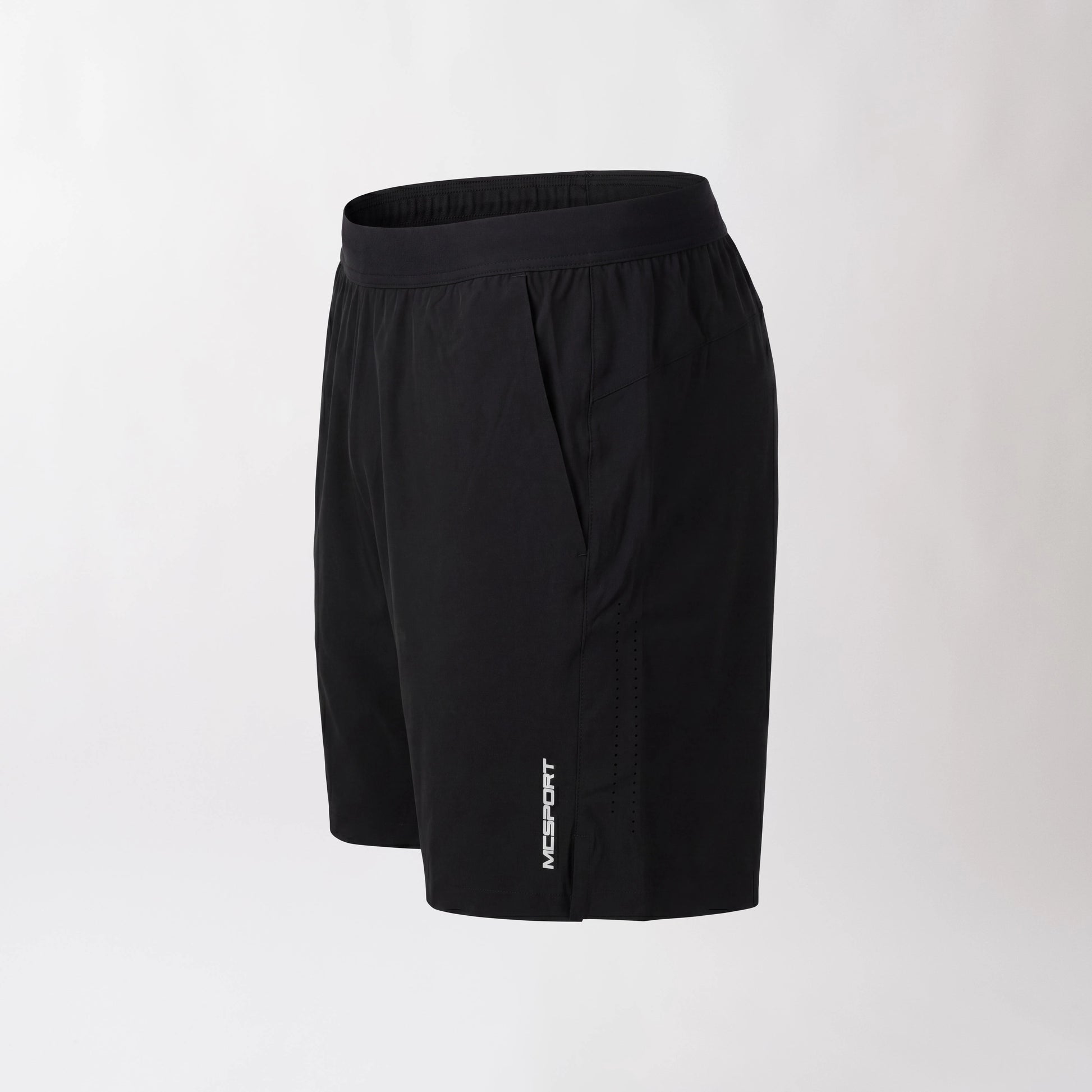 Pantaloncini neri sportivi da uomo con tessuto 4-way stretch, ventilazione laser, tasca con zip e massimo comfort per ogni allenamento.